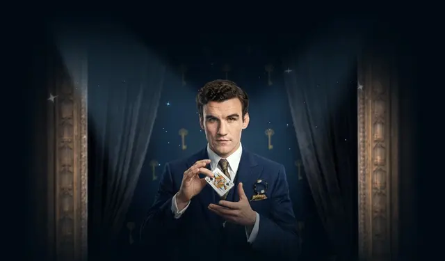High Roller host in a blue suit at Elite Spin